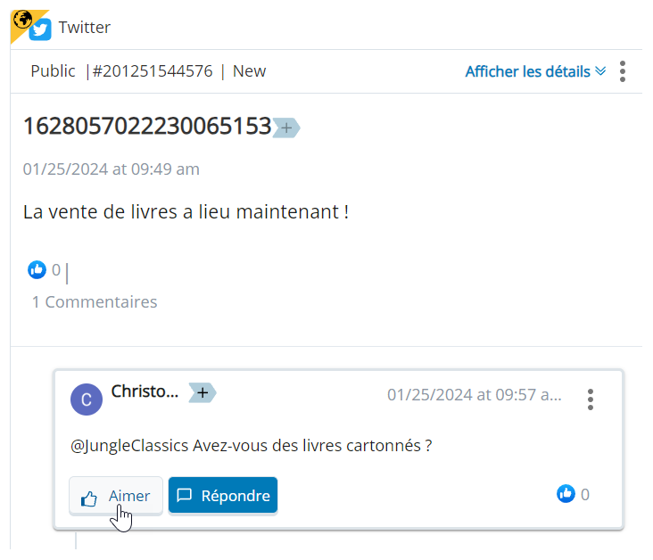 Le tweet d’origine s’affiche avec le tweet de réponse en-dessous. Le curseur survole le bouton J’aime.