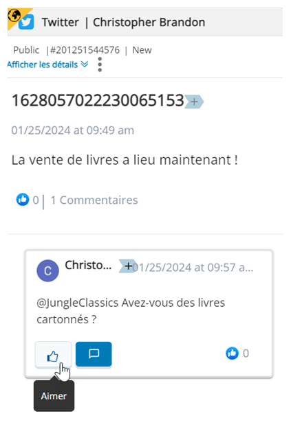 Le tweet d’origine s’affiche avec le tweet de réponse en-dessous. Le curseur survole le bouton J’aime.